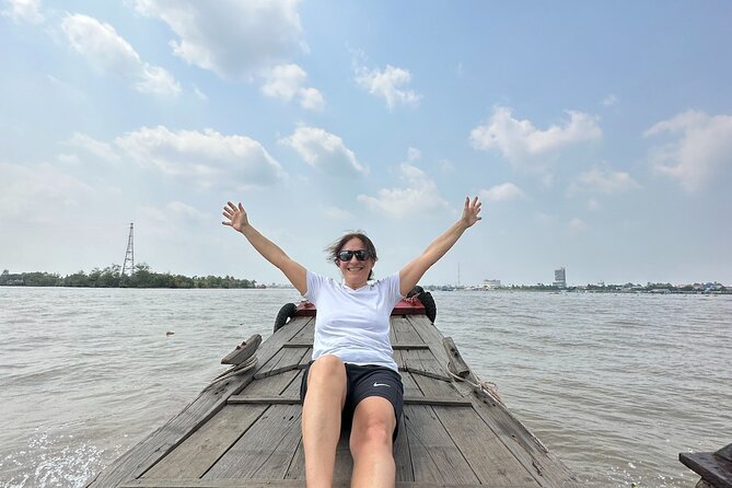 Ben Tre - Coconut Land Private One Day Guide Mekong Delta Tour Excursion - Cruising Ham Luong river: fishing, water transfering, and coconut banks