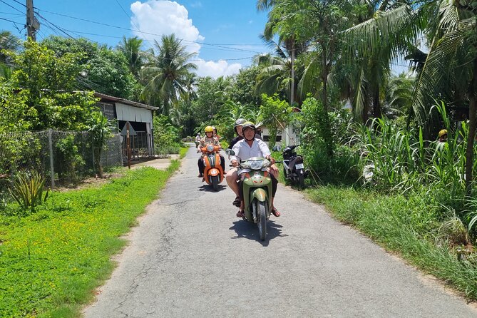 Ben Tre Mekong Zig Zag: Scooter, Sailboat, and Food (Full day) - Sailboat on the Mekong and Quiet Canal Time