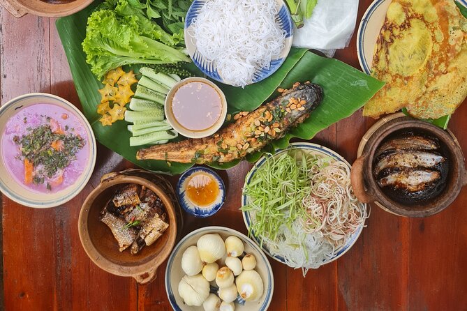 Ben Tre Mekong Zig Zag: Scooter, Sailboat, and Food (Full day) - Ben Tre City Streets: Market Time, Street Food, and Snacks Locals Actually Eat