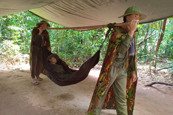 Cu Chi Tunnel Half Day Group Tour With Guide - Cassava sampling and the AK47 try: hands-on, but with context
