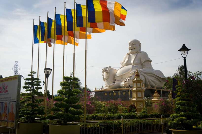 Essential Mekong Delta: Highlight Tour from Ho Chi Minh City - Vinh Trang Pagoda in My Tho: A Sacred Stop With a Guided Pace