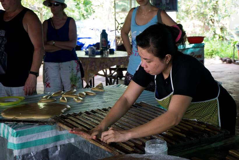 Essential Mekong Delta: Highlight Tour from Ho Chi Minh City - Tan Thach Canal by Hand-Rowed Sampan: Where the Delta Gets Quiet