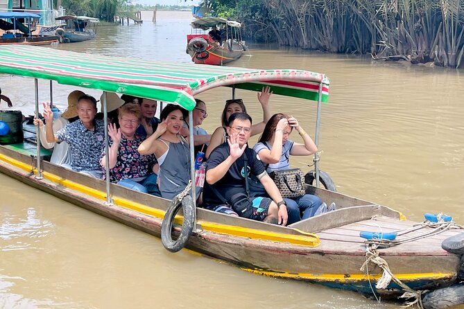 From Ho Chi Minh City: Discover Mekong Delta & Coconut Village - Unicorn Island rides: bike time and a motorized rickshaw tour