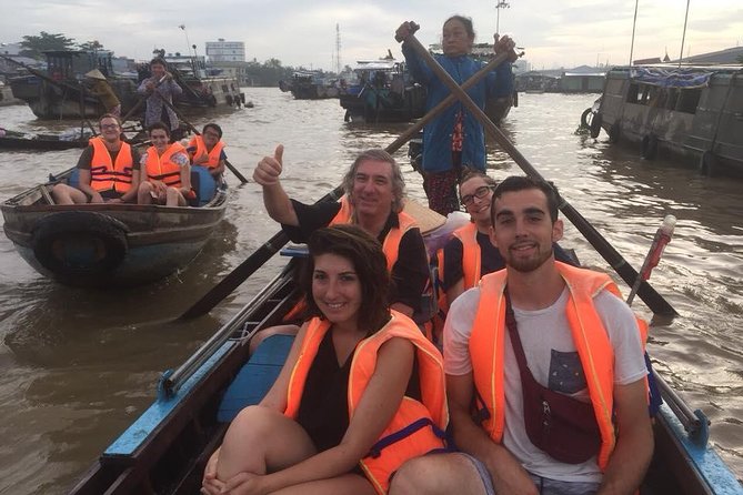 Full-day Cai Rang floating market - explore countryside, make bakery - from HCM - Cồn Sơn Island: Tropical Paths, Floating Fish Life, and the Snakehead Dance