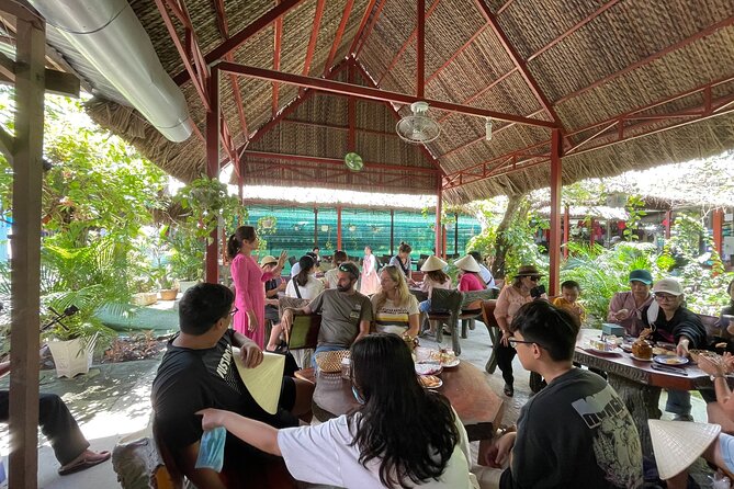 Full-Day Tour in Mekong Delta with Pick Up in Central District 1 - Con Lan: Honey Tea, Fruit Garden Sounds, and the Electric Cart Ride