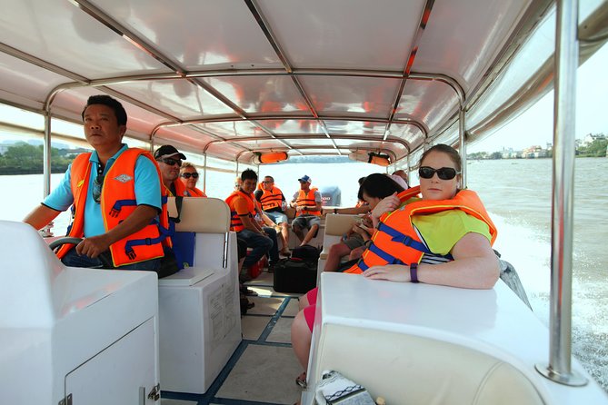 Full-Day Tour in the Cu Chi Tunnels with a Luxury Speed Boat - From District 1 to the river: pickup and the travel rhythm