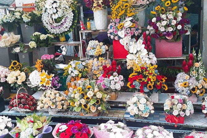Good Morning Saigon Tour by Motorbike and Scooter - District 7’s floating market stop: a different way to trade