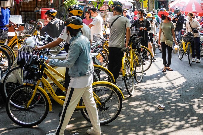 Half Day - Saigon Off-the-Beaten-Path - City Cycling Tour - District 10: a slower pace, the Umbrella Market, and apartments from 1968