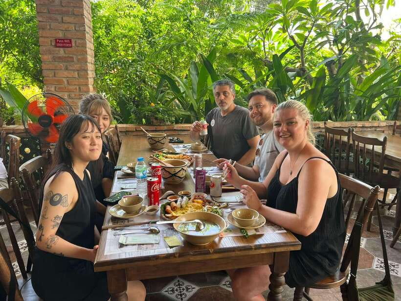 HCMC: Cu Chi Tunnels & Mekong Delta VIP Tour by Limousine - Coconut island and the family stop: fruits, honey tea/wine, and live music