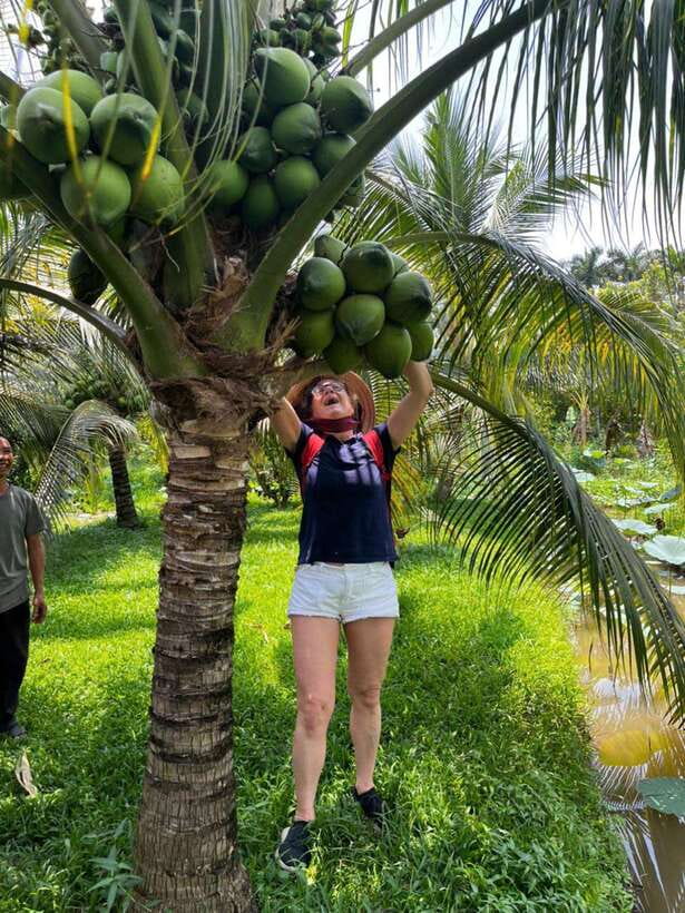 Ho Chi Minh: 1-Day Mekong Delta Tour-Floating Market & Islet - Pineapple on the boat: tasting fruit where it’s sold
