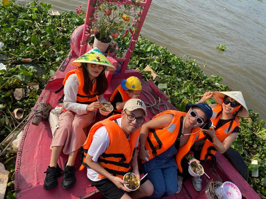 Ho Chi Minh: 1-Day Mekong Delta Tour-Floating Market & Islet - Cồn Sơn islet: fish farm life, koi massage, fruit picking, and monkey bridges