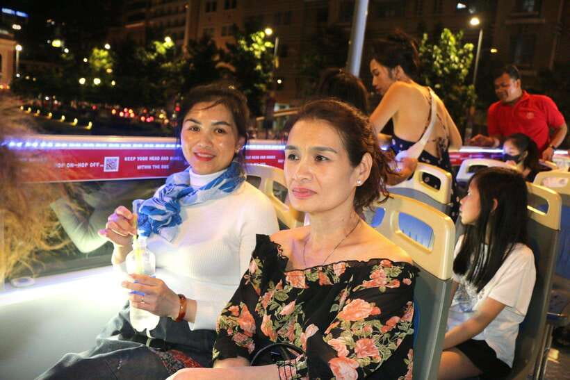 Ho Chi Minh City: Late-Night Open-Top Bus Tour - Comfort and included extras: what you actually get on board