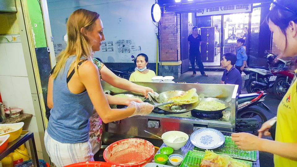 Ho Chi Minh City: Private Street Food Motorbike Tour - District 4 finish: seafood choices, flan, and Forest Banana Sticky Rice Wine