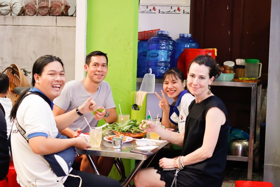 Ho Chi Minh City: Private Street Food Motorbike Tour - District 3 stops: Bánh Xèo, Bánh Khọt, rooftop views, and a pagoda in an apartment