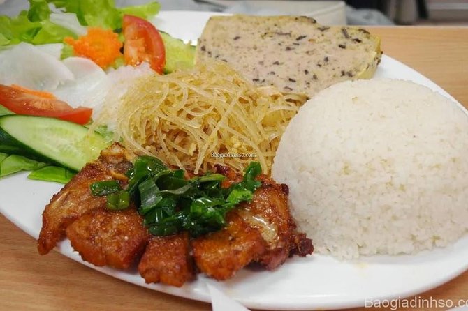 Ho Chi Minh Street Food Tour By Motorbike (Unique & Authentic) - District 3 start: Chuối nếp nướng at Vo Văn Tân
