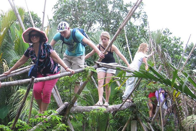 Mekong Delta Boat Tour - The hand-rowed sampan and local music stops