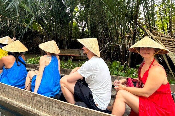 Mekong Delta Guided Tour from Ho Chi Minh City - Rowing into the smaller canals: the under-bridge moment
