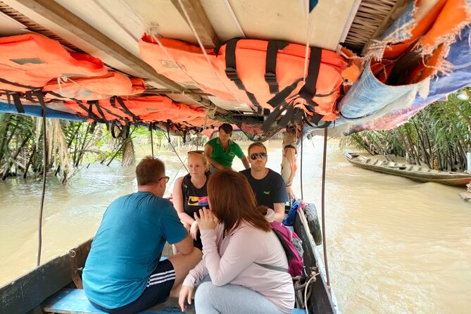 Mekong Delta Tour Daily - Traditional music, lunch by the water, and the hand-rowed boat ride