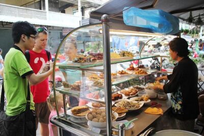 Morning Saigon Unseen+Street Food Tour with Ao Dai Riders Option - Nguyen Thien Thuat street: oldest apartments and life at street speed