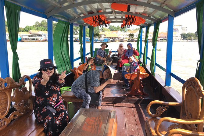 Private Cu Chi Tunnels and Mekong Delta: Full-Day Guided Tour - Cu Chi Tunnels: film, bamboo traps, and the underground maze
