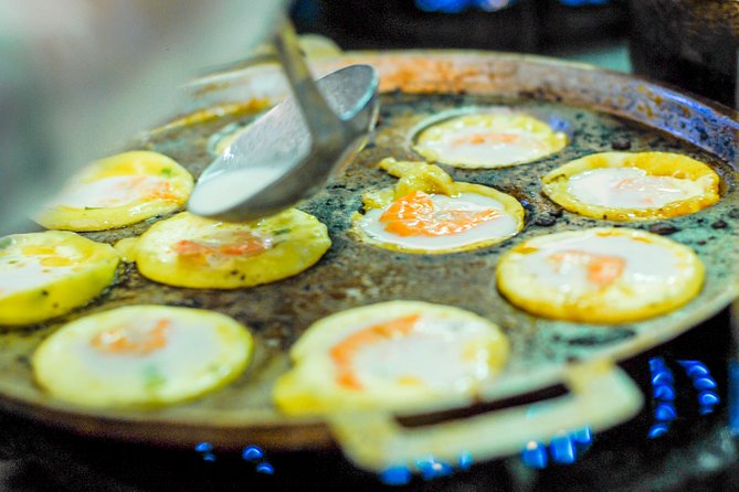 Private Street Food Motorbike Tour in Ho Chi Minh City - Stop Four: District 4 Seafood Dinner, Flan Cake, and a Simple Allergy Plan
