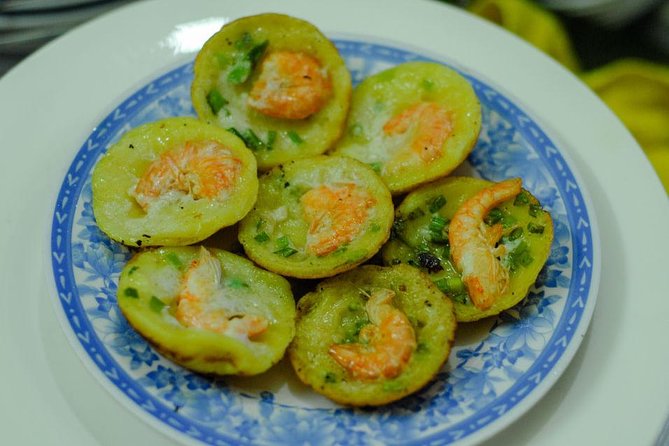 Private Street Food Motorbike Tour in Ho Chi Minh City - The Sights You Get Between Bites: River Banks and an Apartment Pagoda