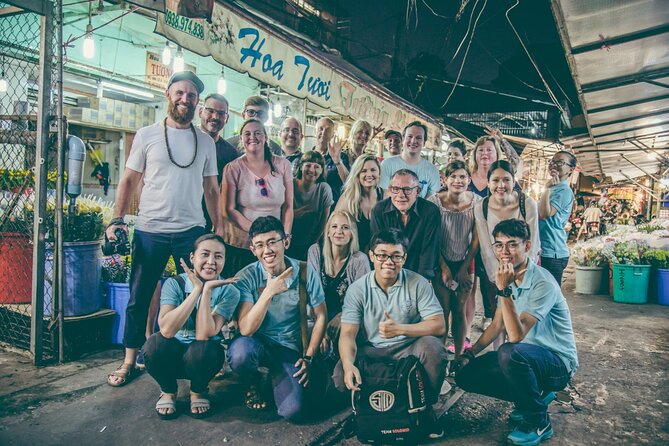 Saigon After Dark Night Tour by Scooter + 7 tastings - Ho Thi Ky flower market: walking, then making crispy banana crackers