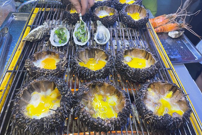 Saigon By Night and Street Food By Motorbike | Opt: Ao Dai Riders - Who should book this motorbike street food night?