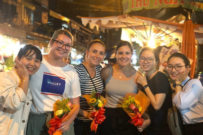 Saigon Evening Food Tour by Scooter - District Hopping Meets a 24/7 Flower Market