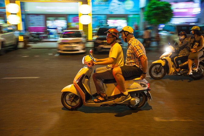 Saigon Night Street Food and City Tour on Scooter - City views: a night ride that feels like Saigon, not a photo tour