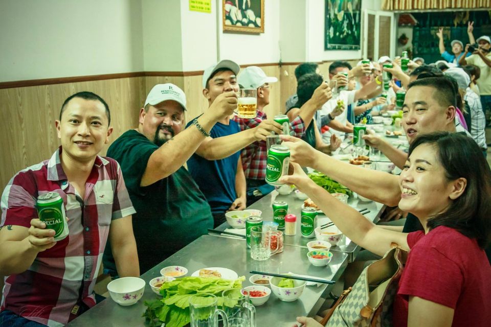 Saigon: Private Food Tour Discovery & City Tour by Jeep - Sky bar payoff: the final drink with Saigon from above