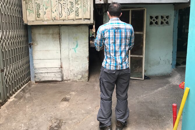 Saigon Slum tour and Saigon Chillspots by motorbike/ Aodai rider - Stop 1: Saigon city orientation that skips the usual script