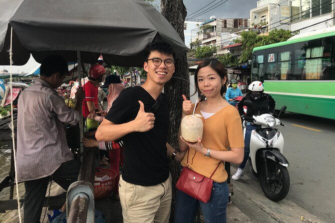 Saigon Slum tour and Saigon Chillspots by motorbike/ Aodai rider - Food and drinks: coconut water, coffee/tea, and regional fare