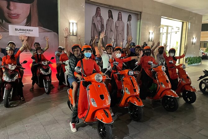 Saigon Vespa By Night Street Food With Female Riders Ao Dai - Seafood street-food start: a salty, local way to kick off the night