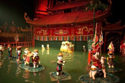 Skip the Line: Golden Dragon Water Puppet Tickets - Entering the theater: the water pool stage setup