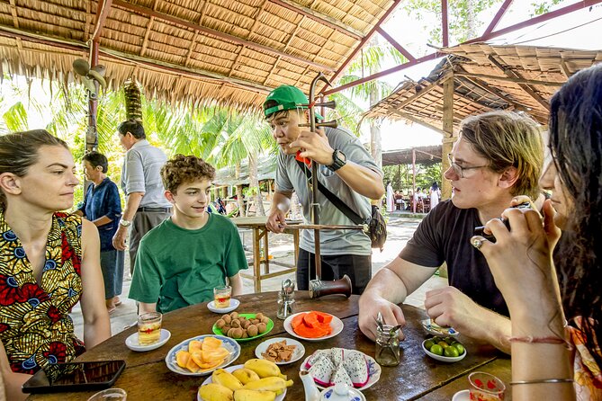 Small-Group Mekong Delta Day Trip: Boat Ride, Cottages & Pagoda - Getting Back to Ho Chi Minh City: Tired but Satisfied