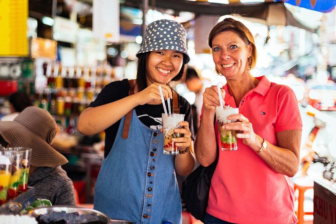 The 10 Tastings of Ho Chi Minh City With Locals: Private Street Food Tour - Independence Palace area: cooling sugar cane juice