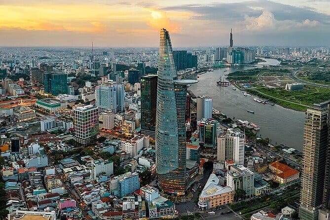 Water Puppet Show And Dinner Cruise On Saigon River Private Tour - The Saigon River dinner cruise: buffet, live music, and skyline views